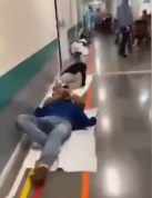 Mit COVID-19 infizierte Patienten am Boden in einem Madrider Krankenhaus [Bild]